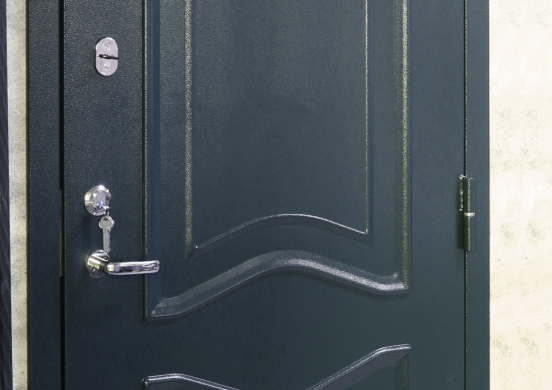 steel door with embossed decorative pattern